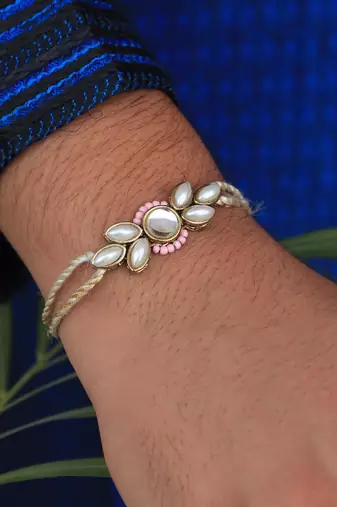 Elegance redefined rakhi with roli chawal