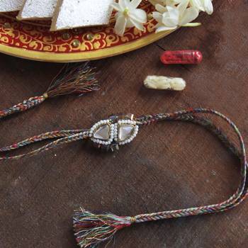 Trillion kundan and bead rakhi with roli chawal 2