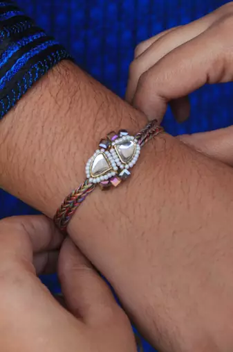 Trillion kundan and bead rakhi with roli chawal