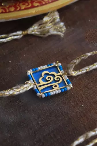 Free spirited beaded rakhi with roli chawal
