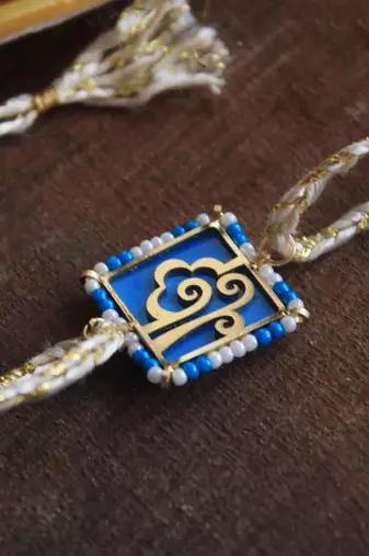 Free spirited beaded rakhi with roli chawal