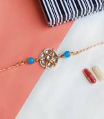 Floral kundan rakhi with roli chawal