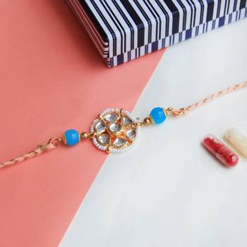 Floral kundan rakhi with roli chawal 2