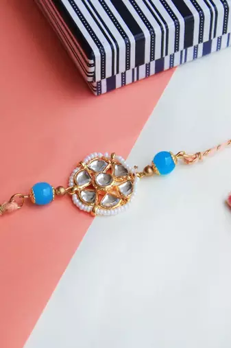 Floral kundan rakhi with roli chawal