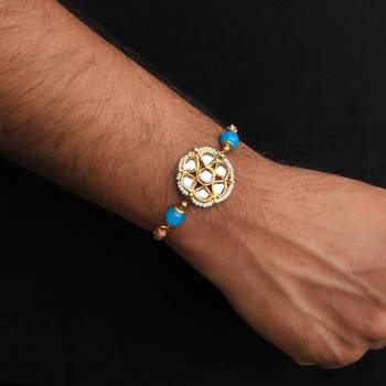 Floral kundan rakhi with roli chawal 3