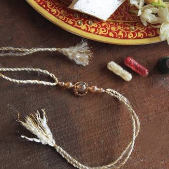 Gleaming beads rakhi with roli chawal 2