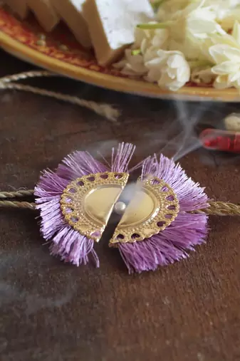 Lilac tassel rakhi with roli chawal