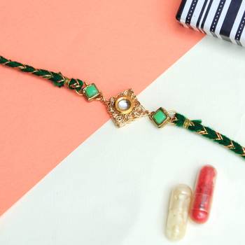Green kundan with mesh rakhi with roli chawal 1