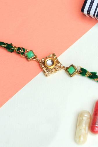 Green kundan with mesh rakhi with roli chawal