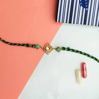 Green kundan with mesh rakhi with roli chawal 4