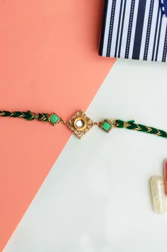 Green kundan with mesh rakhi with roli chawal