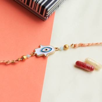 Hamsa evil eye rakhi with roli chawal 1