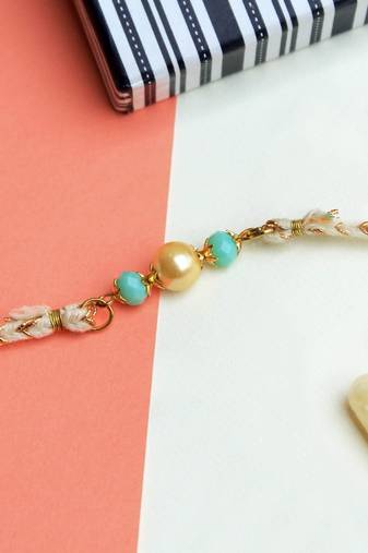 Joyful beads rakhi with roli chawal