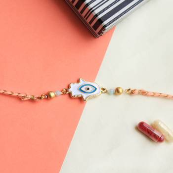 Hamsa evil eye rakhi with roli chawal 2