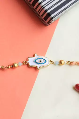Hamsa evil eye rakhi with roli chawal