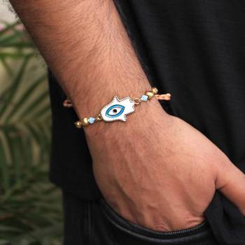 Hamsa evil eye rakhi with roli chawal 3