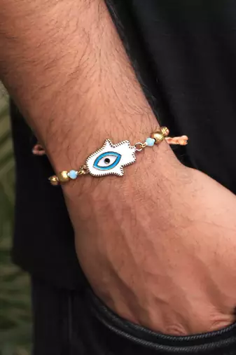 Hamsa evil eye rakhi with roli chawal