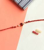 Classic red & gold rakhi with roli chawal