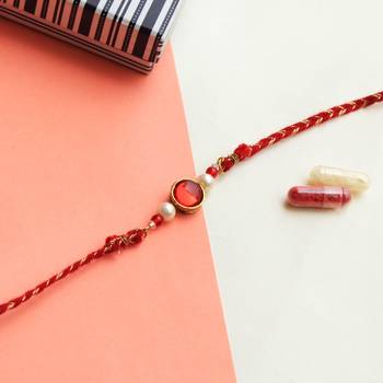 Classic red & gold rakhi with roli chawal 2