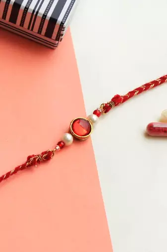 Classic red & gold rakhi with roli chawal