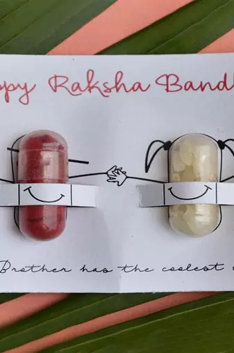 Classic red & gold rakhi with roli chawal