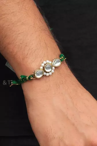 Kundan amaze rakhi with roli chawal