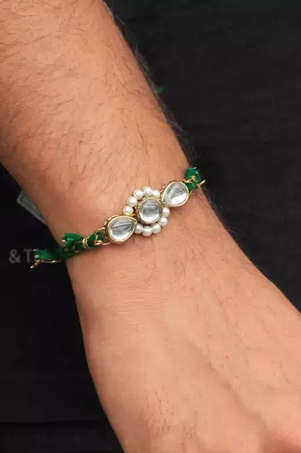 Kundan amaze rakhi with roli chawal