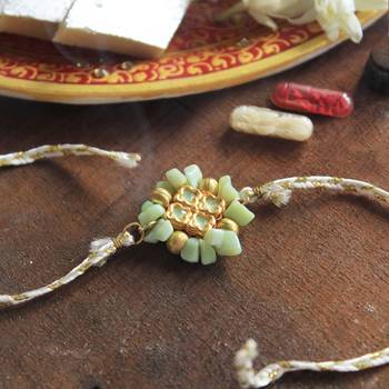 Lush green rakhi with roli chawal 1