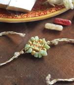 Lush green rakhi with roli chawal