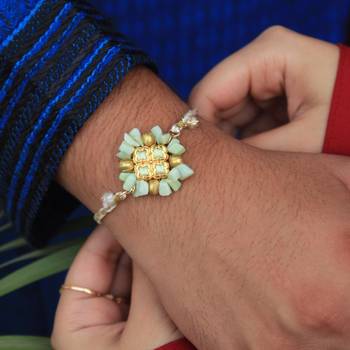 Lush green rakhi with roli chawal 3