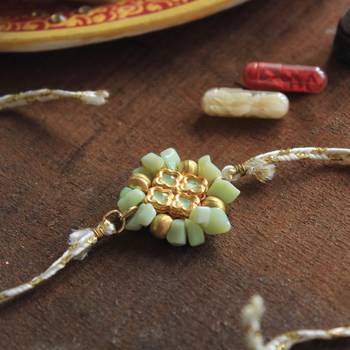 Lush green rakhi with roli chawal 4