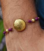 Golden crescent rakhi with roli chawal