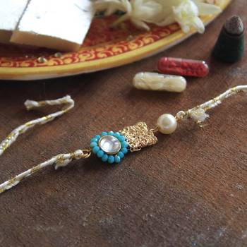 Skyey kundan pearl rakhi with roli chawal 3