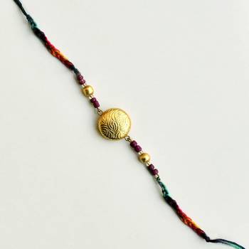Golden crescent rakhi with roli chawal 4