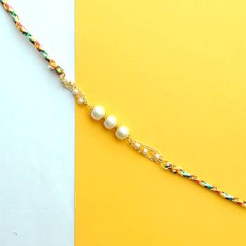 Pearly rakhi with roli chawal 1