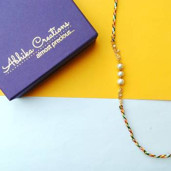 Pearly rakhi with roli chawal 2