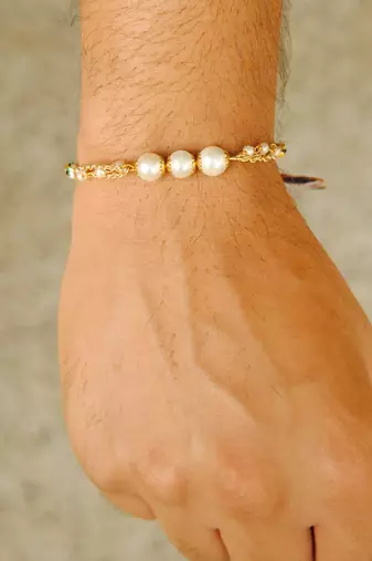 Pearly rakhi with roli chawal