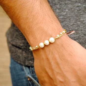 Pearly rakhi with roli chawal 4