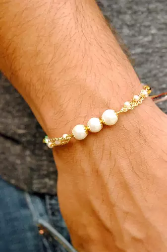Pearly rakhi with roli chawal