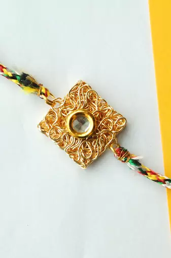 Square mesh rakhi with roli chawal