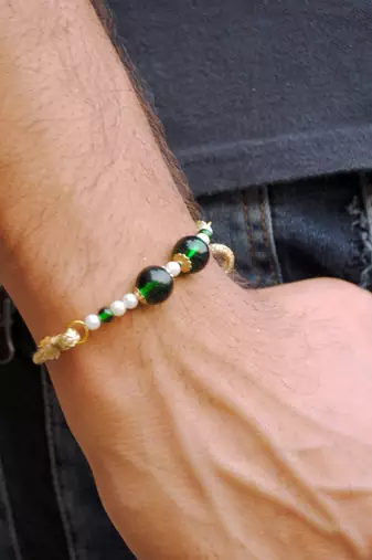Green pearl rakhi with roli chawal
