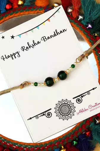 Green pearl rakhi with roli chawal
