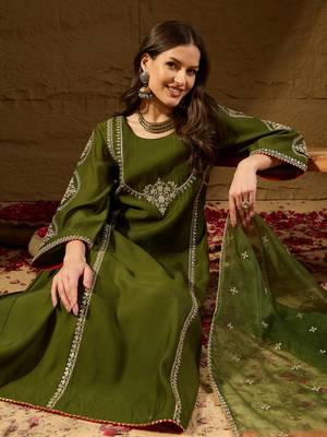 Women green silk blend embroidered a-line kurta sets 1