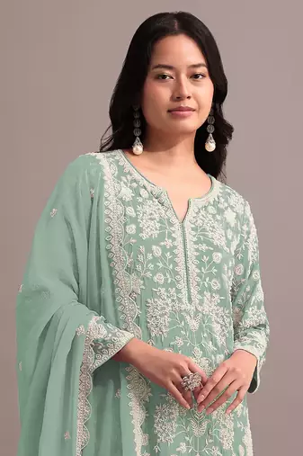 Green embroidered faux georgette palazzo style salwar suit