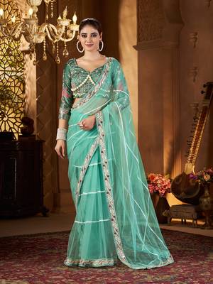 Blue net embroidery work saree with unstitched blouse piece 1