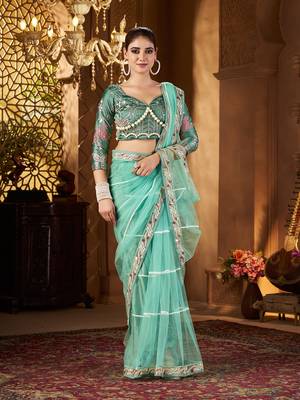 Blue net embroidery work saree with unstitched blouse piece 2