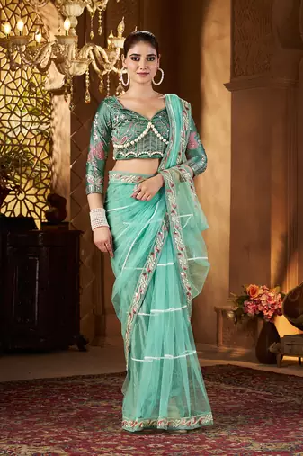 Blue net embroidery work saree with unstitched blouse piece
