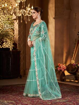 Blue net embroidery work saree with unstitched blouse piece 3