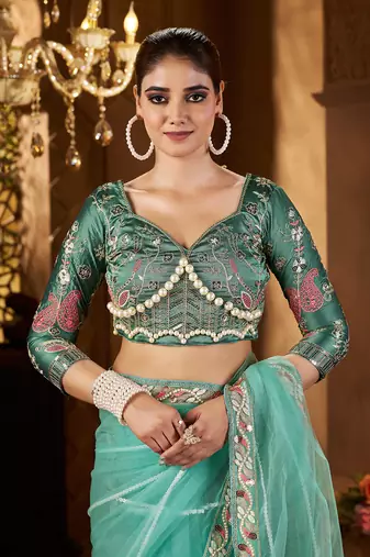 Blue net embroidery work saree with unstitched blouse piece