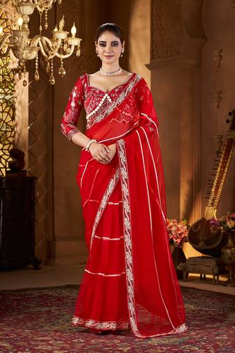 Red net embroidery work saree with unstitched blouse piece